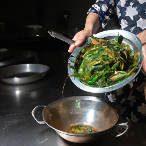 Đầu bếp đang chuẩn bị món ốc bươu xào la lốt trong không gian bếp truyền thống Việt Nam.