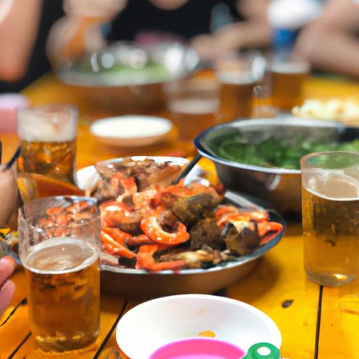 Một nhóm bạn thưởng thức hải sản và bia tại Quán ốc Lan 2