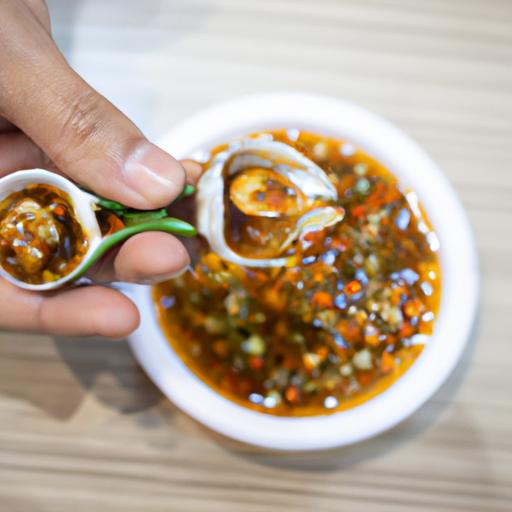 Hương vị đậm đà của ốc lác xào sả ớt nằm trong từng nấc trong từng chiếc vỏ, khiến cho bạn không thể rời mắt khỏi món ăn này.
